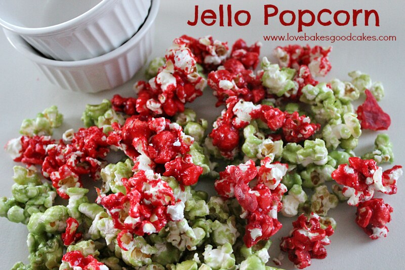 Jello Popcorn red and green popcorn on a plate.
