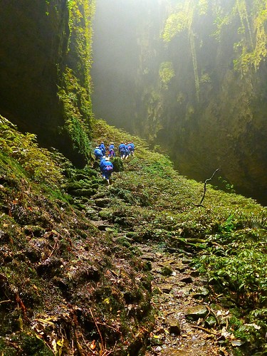 hiking into the "Lost World" cave