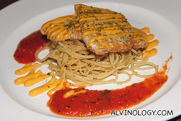 Piccata of Pork (S$18) - pan-fried parmesan battered pork loin topped with cheese sauce, served with spaghetti 