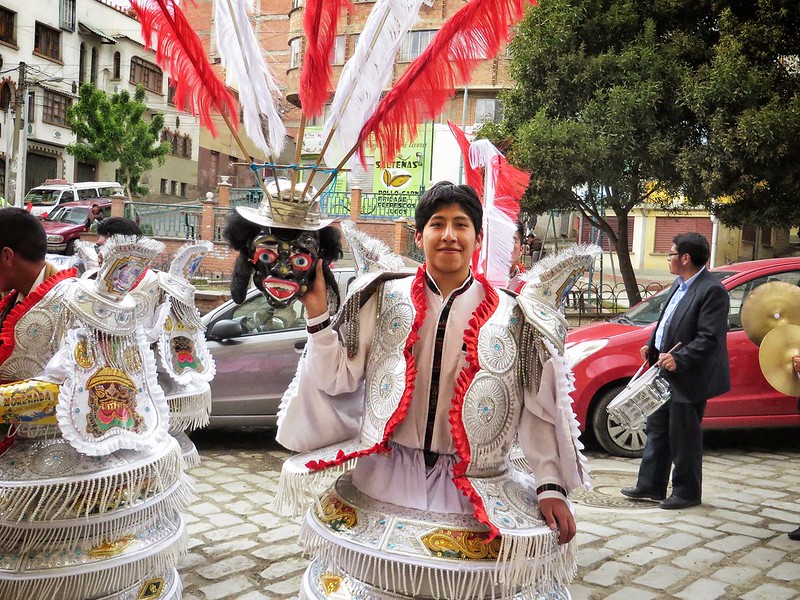 A boy displays his parade mask in La Paz, Bolivia