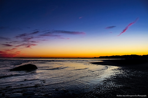 goose rocks beach maine sun sunset blue yellow orange pink silhouette coast sea sand rock texture dark water ocean