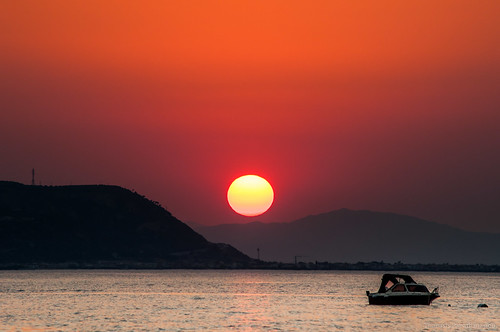 sunset sea sky sun mountain boat greece peloponnese korinthia peloponnisos derveni