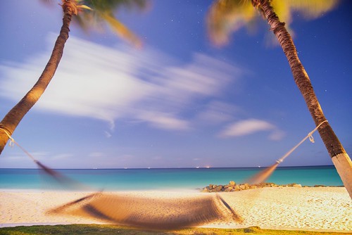 sunset beach water nikon waves dusk resort aruba palmtrees palmtree hammock hdr oranjestad d600 nikond600 oranjestadaruba diviresort davedicello sunsetinaruba hdrexposed diviallinclusive tamarijnallinclusive dusksunsetinaruba