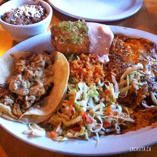 2 Mix Veggie Suiza Enchiladas, 1 Mix Pepper and Crema Taco & 1 Mushroom Chimichanga with Rice & Beans in Vancouver BC