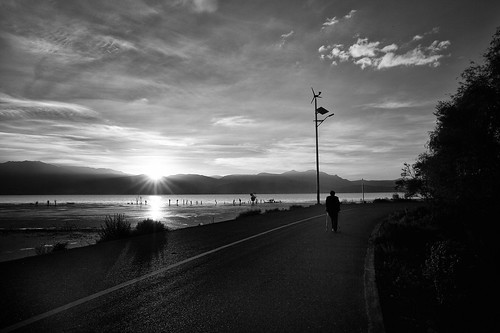 china road street trees sky sun lake man lines clouds sunrise walking asia mood documentary yunnan dali curve crutches drama leadinglines xizhou mimokhairphotography