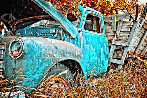 auto old travel blue light brown canada green fall classic abandoned field grass wheel yellow metal rural truck vintage wooden junk rust automobile antique farm parts wheat country neglected engine pickup tire cargo storage photoblog fender pasture transportation worn vehicle hood weathered headlight harris saskatchewan retired deserted rugged oldfashioned flatbed