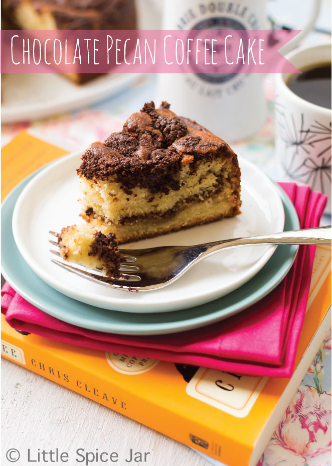 Chocolate Pecan Coffee Cake on stack of plate, napkin and book