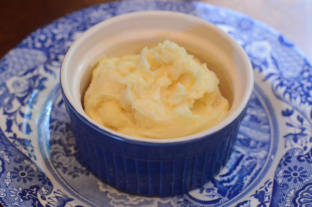 Honey butter in a small blue ramekin.