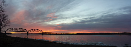 bridge blue sunset red reflection silhouette yellow clouds missouririver chamberlainsd lakefranciscase southdakotarailroad