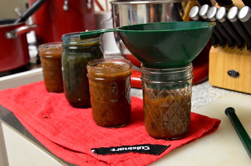 Filling the jars with rhubarb chutney