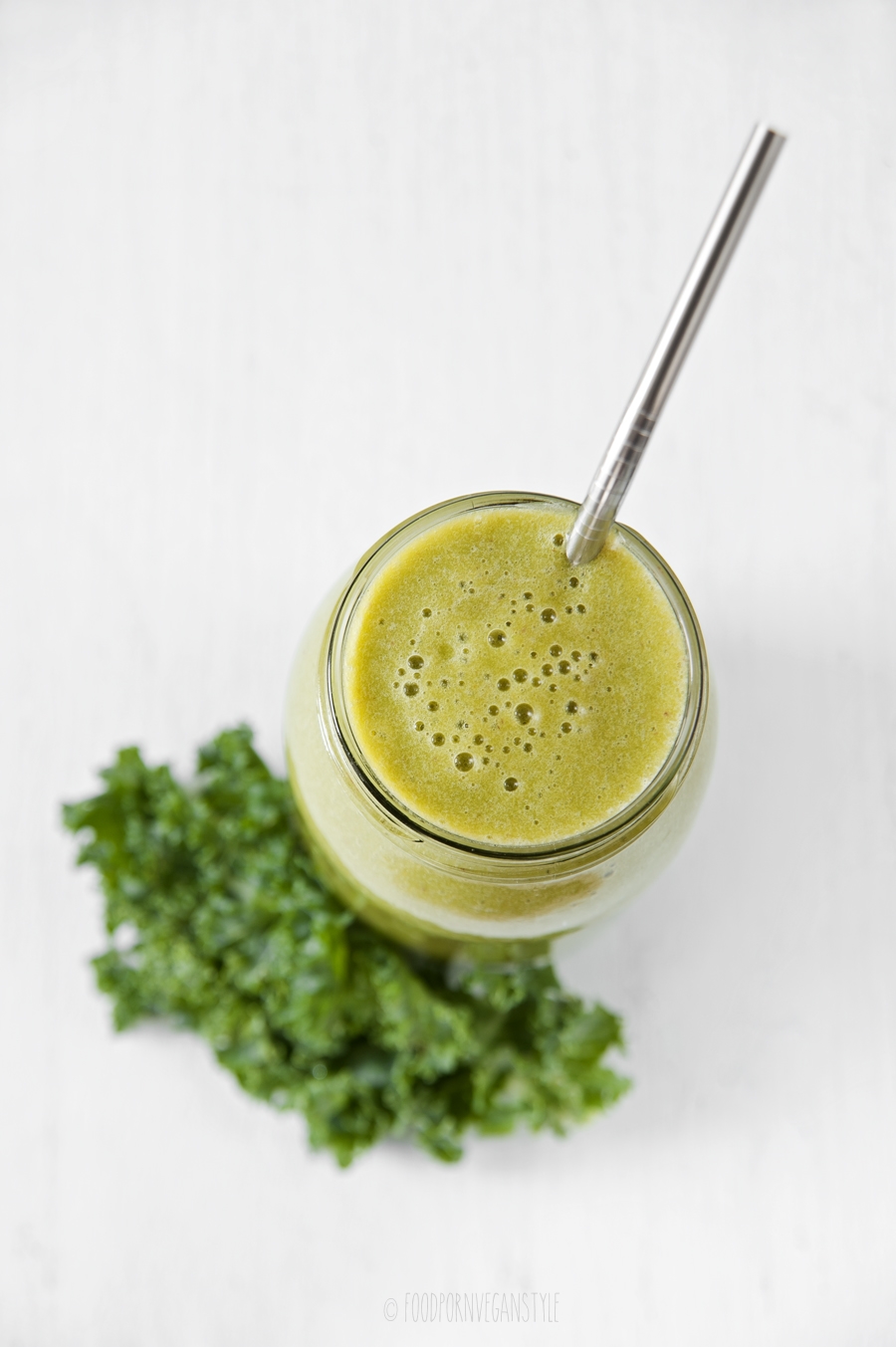 Green smoothie with kale, apricots, pineapple and nectarine