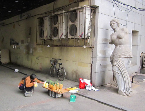 china travel urban tourism bicycle statue contrast underpass concrete asia backalley district candid kingdom backstreet classical marble aphrodite middle juxtaposition shenyang province koreatown streetview streetvendor liaoning grotty unstaged xita idealvsreality
