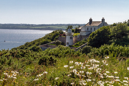 travel flowers ireland sea summer lighthouse tourism water beautiful grass landscape outside outdoors day exterior country scenic sunny shore daytime hillside wexford duncannon dandangler