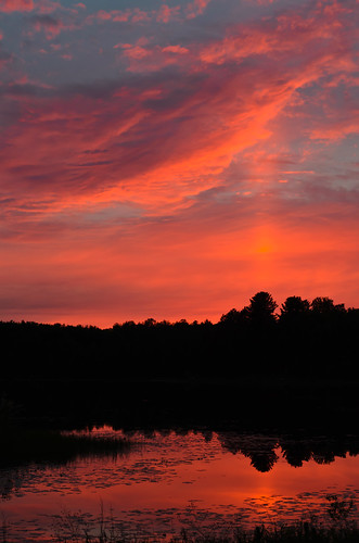 pink blue sunset sky orange sun lake reflection water silhouette clouds landscape evening glow michigan column blaze