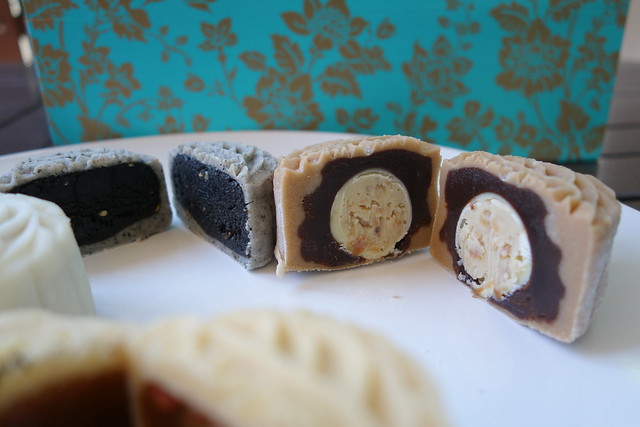 Yan Ting's Black Sesame & Melon Seeds Crunch and Chocolate Royal Liqueur Truffle Snowskin Mooncakes - Cross-section