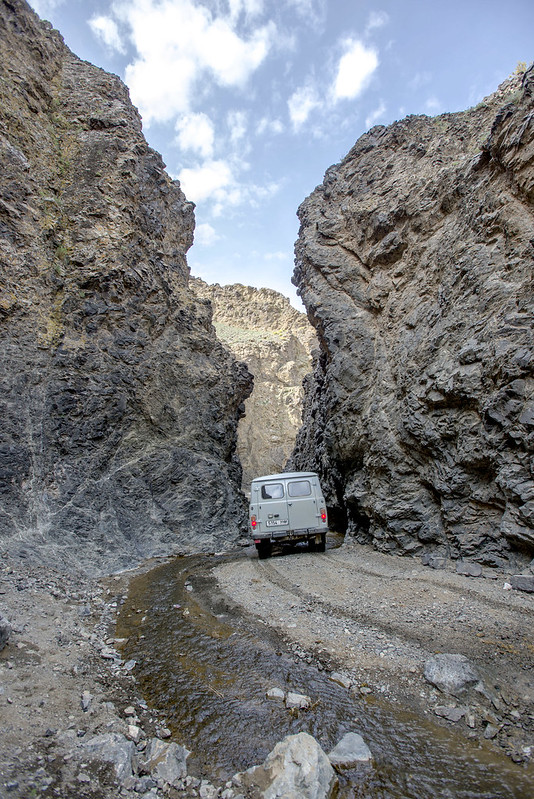 van driving between canyon
