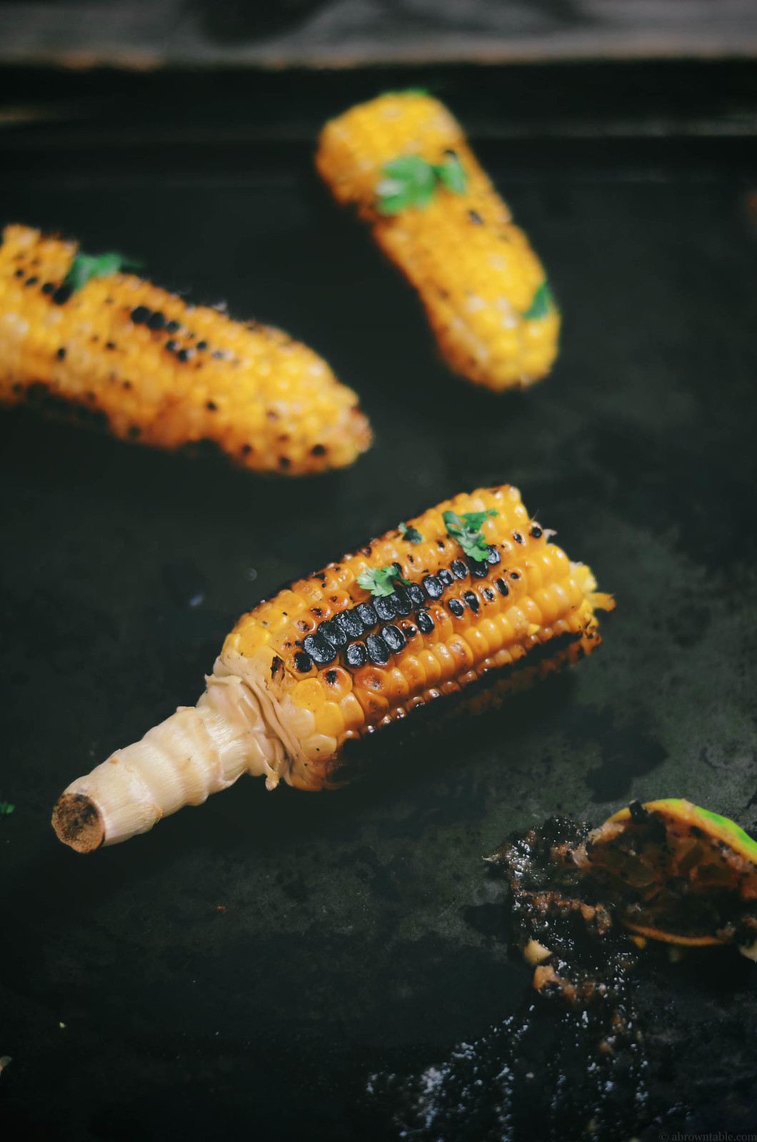 Indian style grilled sweet corn bhuta