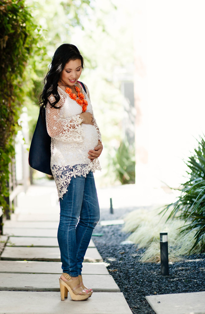 cute & little blog | petite fashion | maternity pregnant bump style | crochet top, ag distressed skinny jeans, deux lux navy tote, floral bib necklace | summer