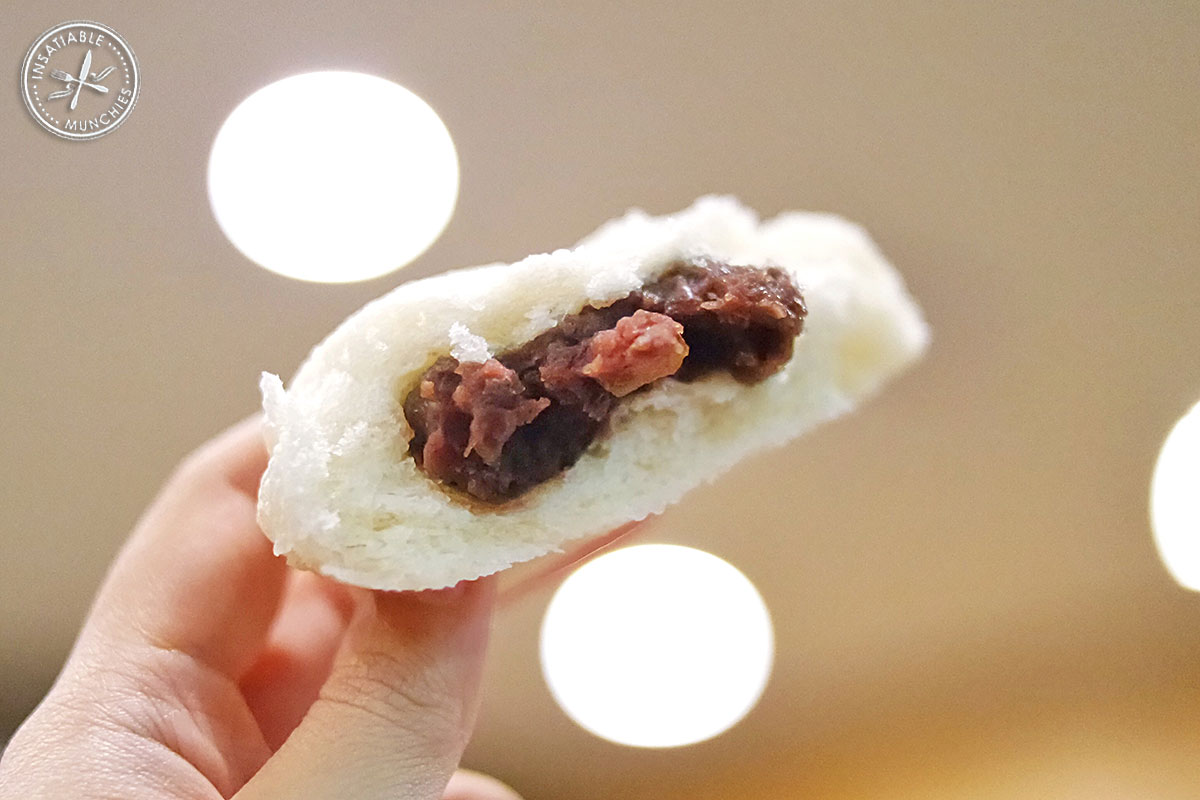 Sweet red bean paste is encased in fluffy white dough and steamed to create this red bean bun.