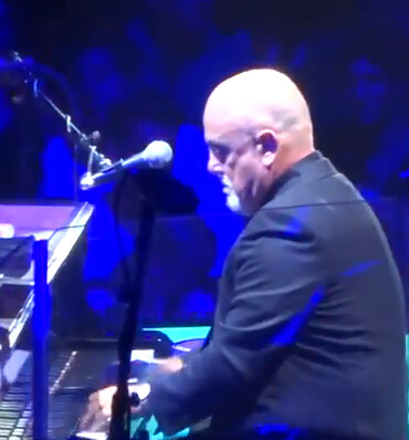 Billy Joel plays