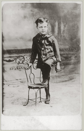 RPPC Boy and chair