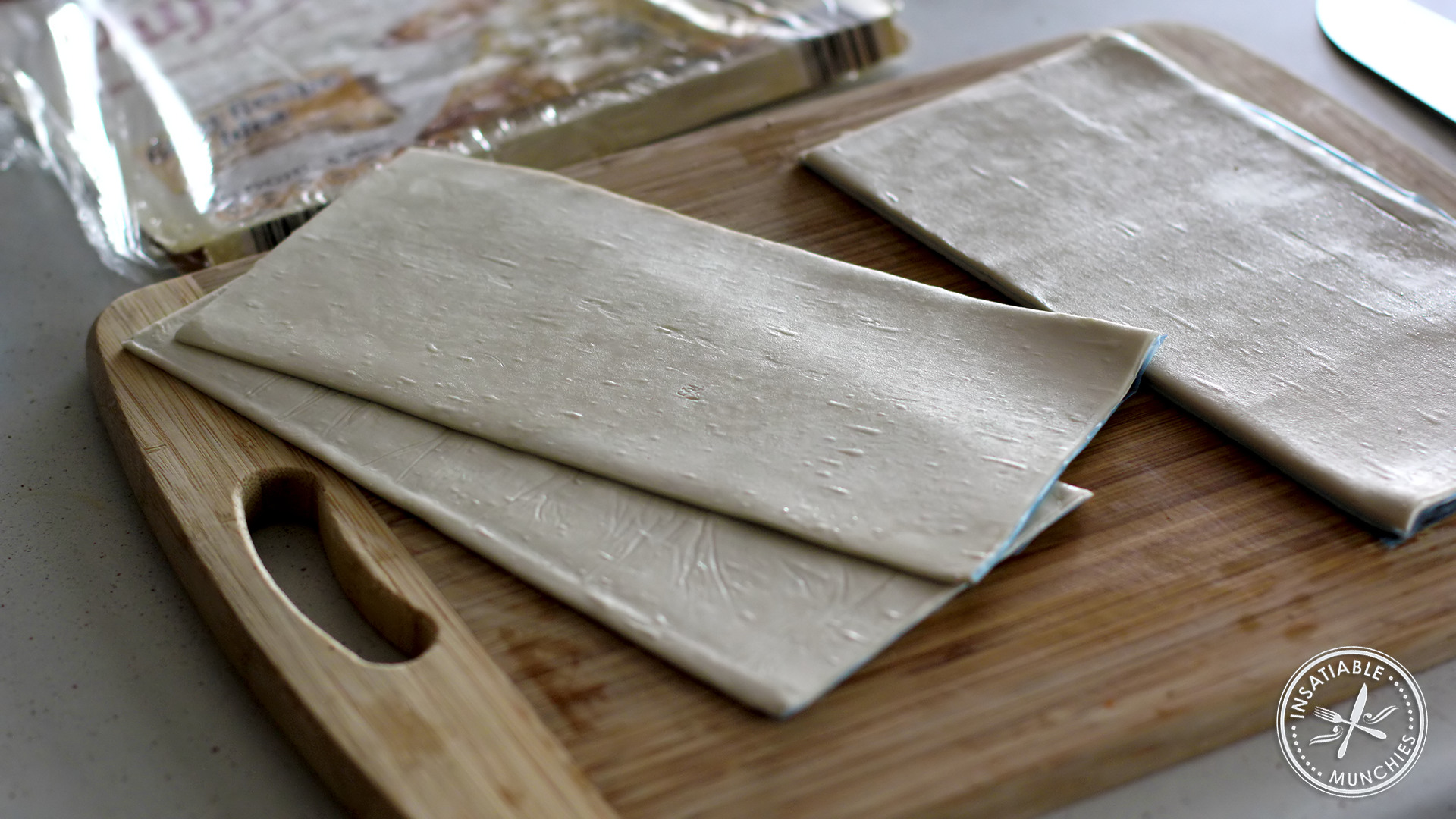 Two sheets of puff pastry that will form the top and bottom of the pie. 