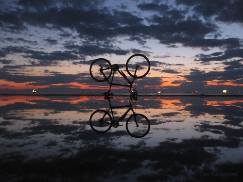 sunset reflection water bike bicycle clouds flying seaside thessaloniki cloudporn