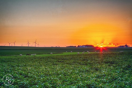 sunset tractor field farm iowa ia lakepark beanfield haybale windfarm johndeere windgenerator spiritlake okoboji