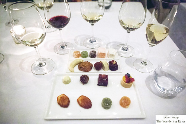 Our petit fours surrounded by my wall of wines