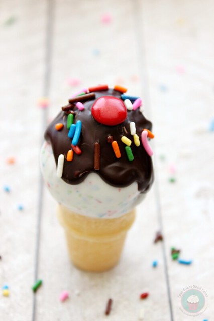 Ice Cream Cone Cake Pops with chocolate syrup and rainbow sprinkles close up.