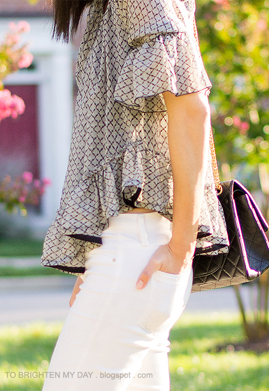 ruffled silk top, black crossbody bag, white jeans