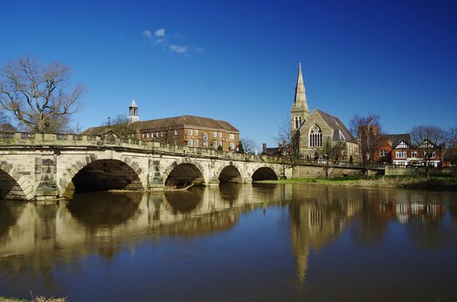 shrewsbury english bridge severn river water reflection sky blue clear light stone