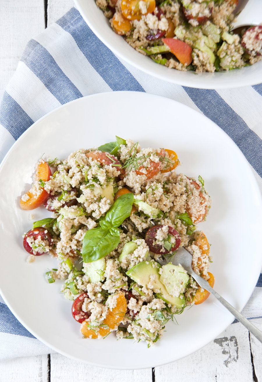 Light and fresh summer salad with couscous, cherry tomatoes, apricots and basil