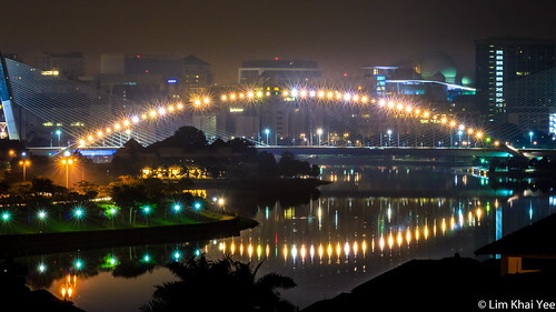 cyberjaya night bridge reflection river
