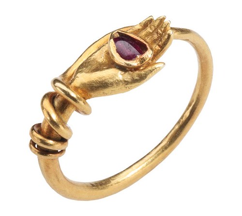 14.gold-ring-with-hand-holding-a-heart_l