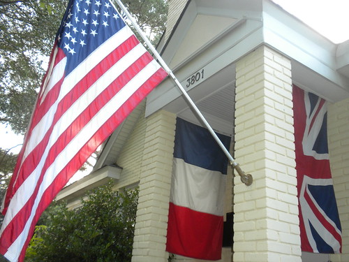 flags flagge fahne banner stripes red white blue usa france britain uk england sc carolina memory dday invasion war peace hang pole symbolism symbol 3801 porch southcarolina hanging breeze hot summer day view camera remember gallantry luck gamble courage valor sacrifice fear poland germany ussr krieg clinton hillary eisenhower roosevelt