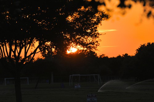 sunset texas orangesky lightshadow sugarland goalposts endoftheday aaaaaah darktrees watersprinklers eldridgepark ahobblingaday