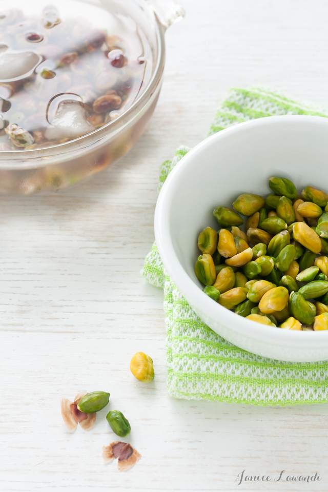 how to blanch and peel pistachios by blanching the pistachios and then shocking in a bowl of ice water | Janice Lawandi @ kitchen heals soul