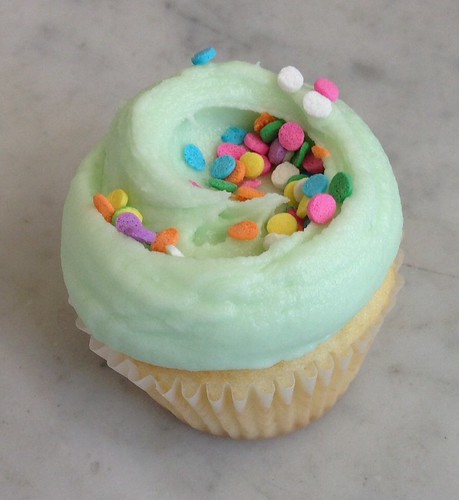 Mini vanilla cupcake with butter cream frosting from Magnolia Bakery