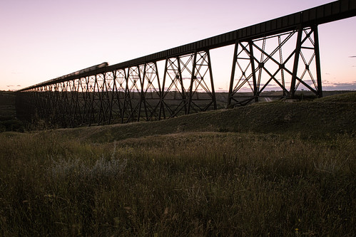 trestle bridge sunset canada field grass train dusk hill rail railway hills alberta valley hilly lethbridge grassy