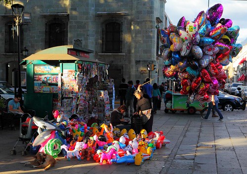 city sunset urban colors sunshine balloons mexico toys ngc oaxaca sunsetlight newstand worldtrekker