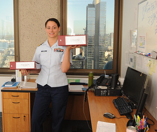 Lt. Karen Appel, budget officer of the 13th Coast Guard District, competed against high-performing military and civilian financial officers from all branches of the Armed Forces to earn the Meritorious Award with the American Society of Military Comptrollers in the Accounting and Finance category, which was presented to her in Seattle, May 28, 2014. Appel is also a weightlifting enthusiast who teaches fitness courses and competes in Olympic weightlifting competitions. U.S. Coast Guard photo by Petty Officer 3rd Class Katelyn Shearer.