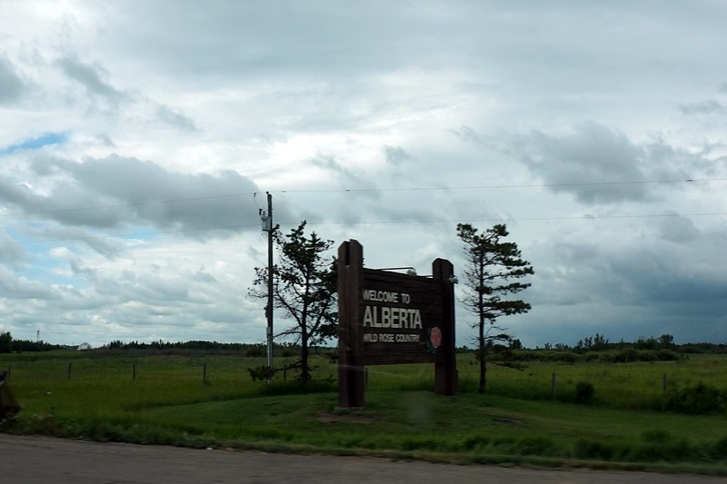 Blurry Welcome to Alberta sign.