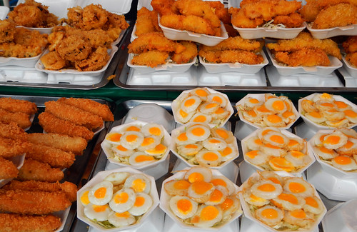 Quail's eggs and other nibbles for sale in Bangkok's weekend Chatuchak Market