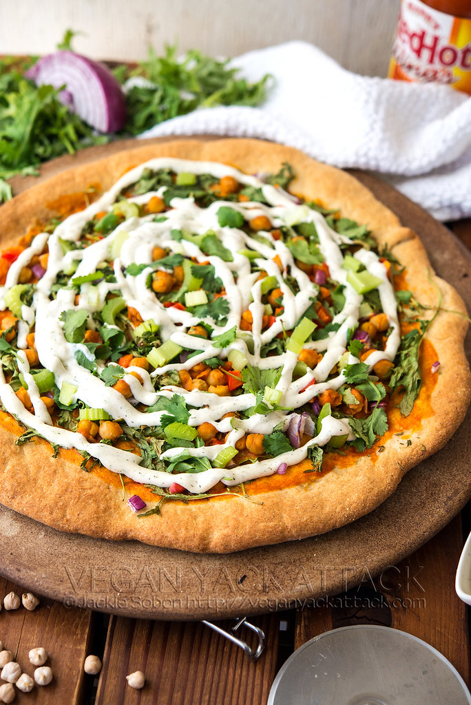 Impossible to resist, this Buffalo Chickpea Ranch Pizza beats them all! Oh, and it's VEGAN! Make this for a supremely tasty dinner, or bring it to a party.