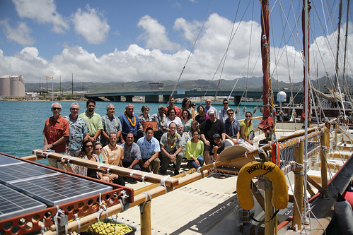 Representatives from multiple conservation groups aboard the Hokule’a, a double-hulled voyaging canoe. The Hokule’a will carry a signed pledge promoting world conservation to its 26 ports of call. (Courtesy Hawaii Conservation Alliance)
