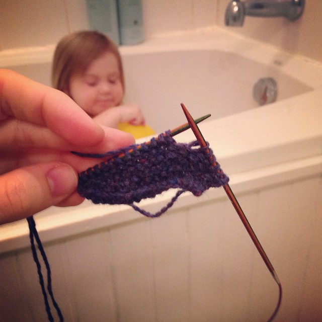 Knitting an elbow patch while M takes a bath.