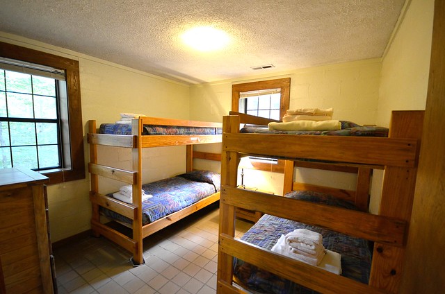 Second bedroom has two sets of bunk beds at Cabin 14 Hungry Mother State Park