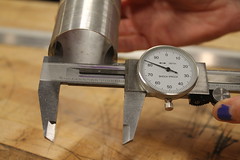 Dial calipers measuring inside diameter