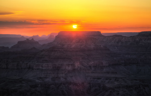 park light sunset arizona orange sun mountains beautiful clouds twilight dusk large deep grand canyon cliffs national